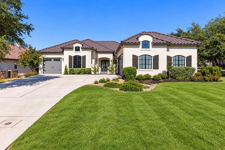 Front elevation of 109 Star Thistle Trail on its corner lot