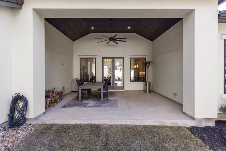 Covered back patio with a tongue-and-groove ceiling