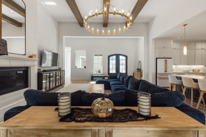 Living room from the fireplace toward the kitchen