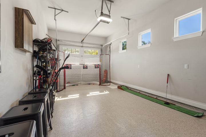 Single-car garage with a putting green